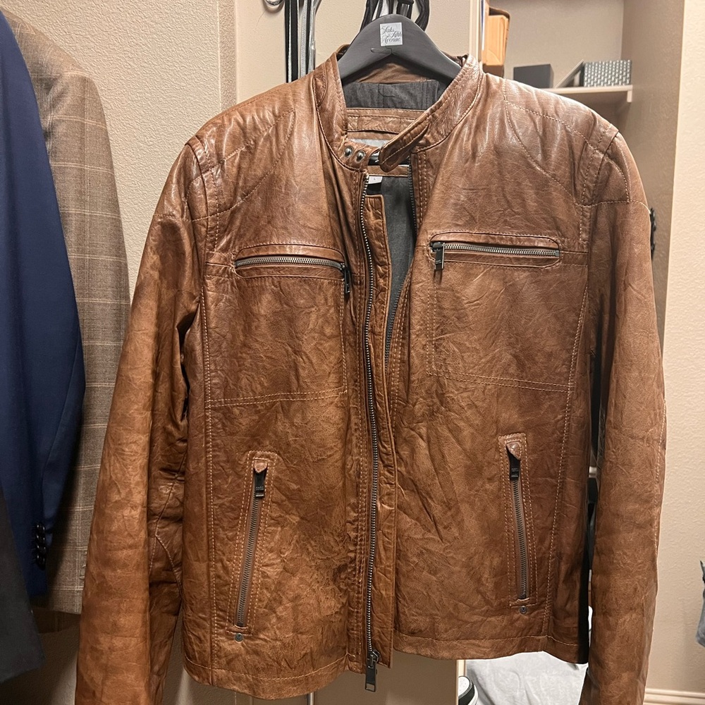 Like new genuine leather jacket. Worn two times, just dont need this in Texas.